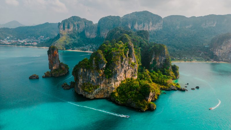 Aerial view of speedboats near an island in Andaman sea
