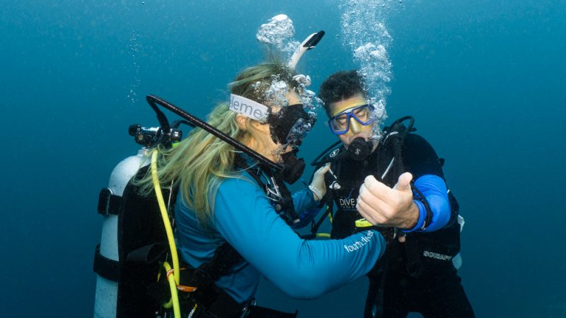 Sophie Morgan, Dive Butler Ambassador, and Dive Butler founder Alexis Vincent underwater diving in the Maldives